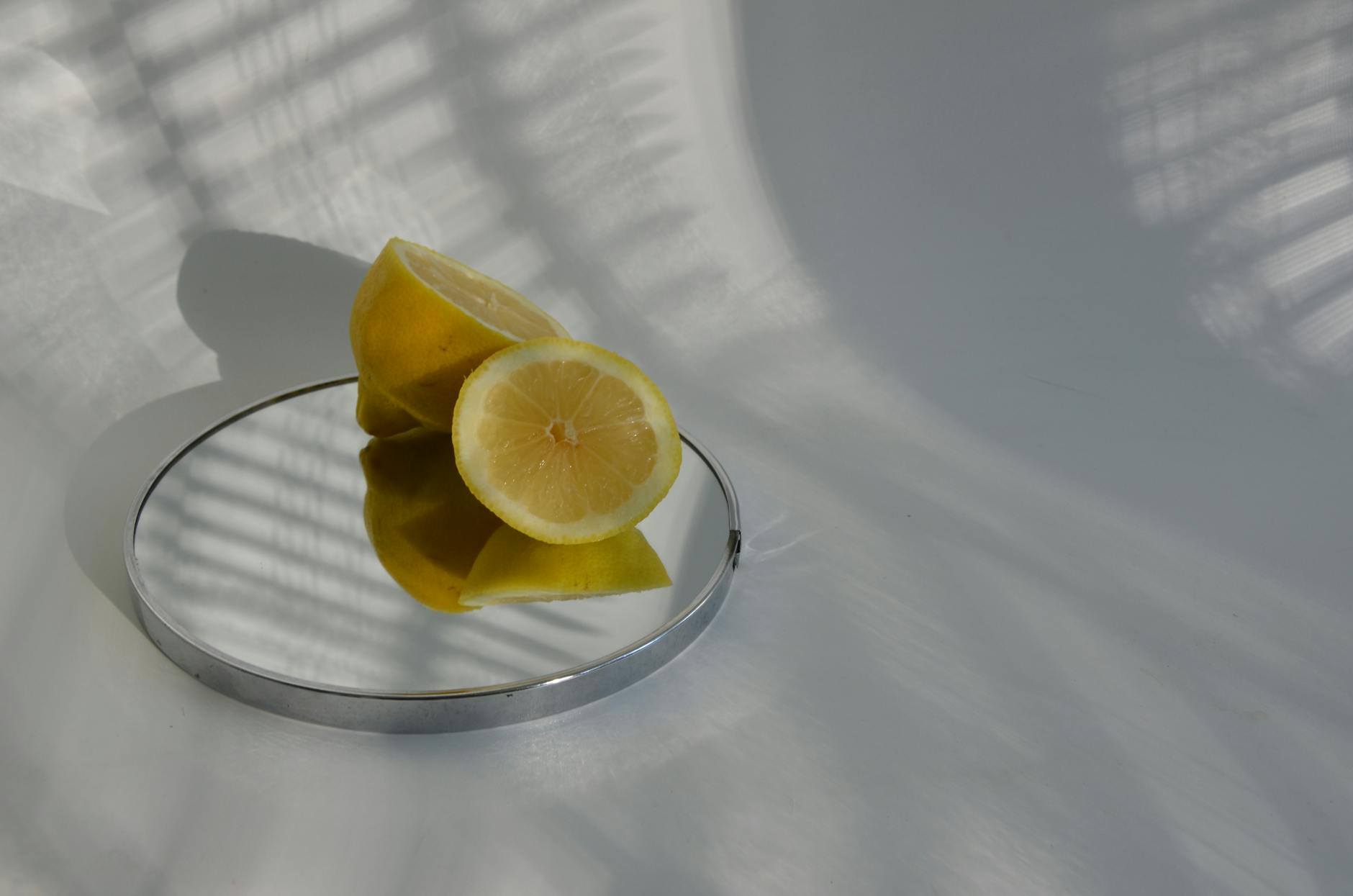 Colorful clitoral vibrators and lemon suction toys displayed on a bright yellow background